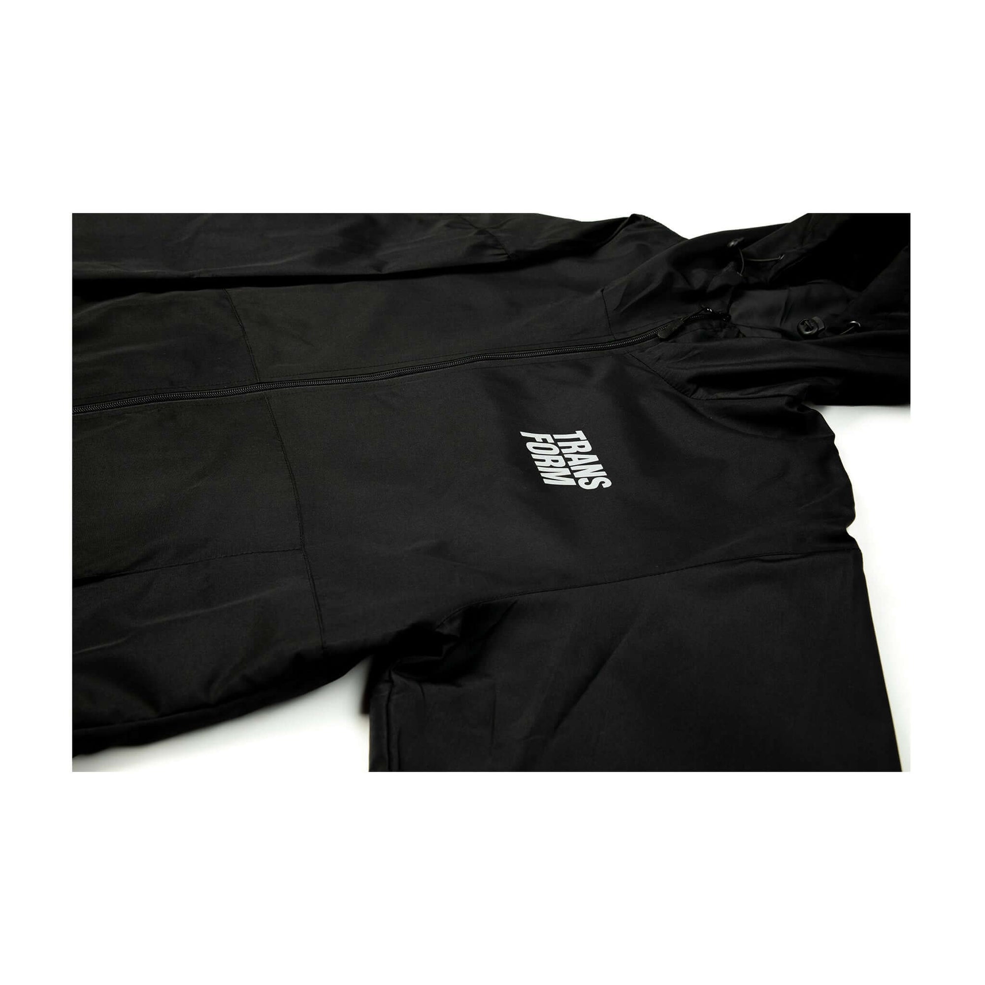 The Stacked Jacket Black - 10k lightweight snowboard shell jacket with adjustable hood, taped seams, and gender-neutral sizing