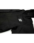 The Stacked Jacket Black - 10k lightweight snowboard shell jacket with adjustable hood, taped seams, and gender-neutral sizing